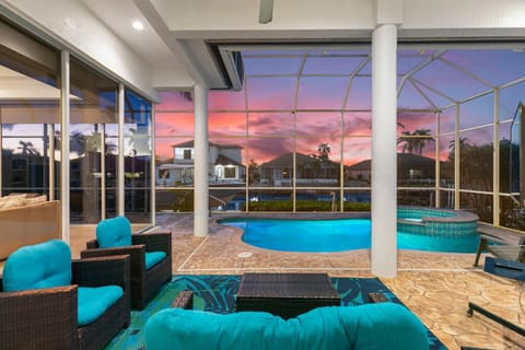 Unique 5 Bed Waterfront Woodbine Ct with Private Pool House in Marco Island