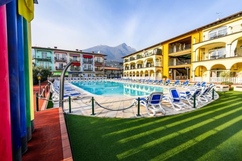 Property building, Natural landscape, Pool view, Swimming pool, sunbed
