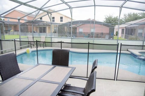 Patio, Day, Seating area, Pool view, Swimming pool, sunbed