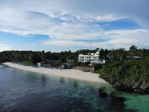 Property building, Day, Natural landscape, Beach, Sea view