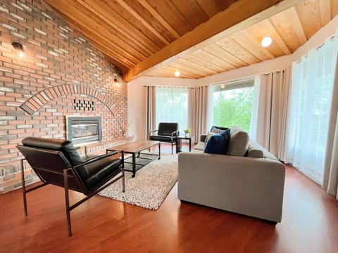 Living room, Seating area, Lake view, flat iron