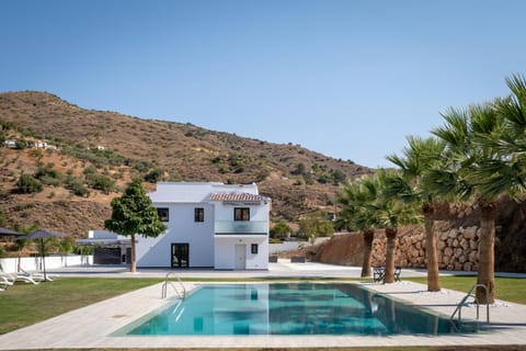 Property building, Living room, Swimming pool