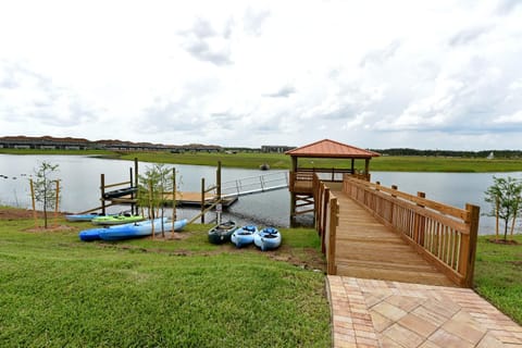 8BR Cozy Lake View Family Oasis at Storey Lake Resort - Near Disney & More! 2903 House in Kissimmee