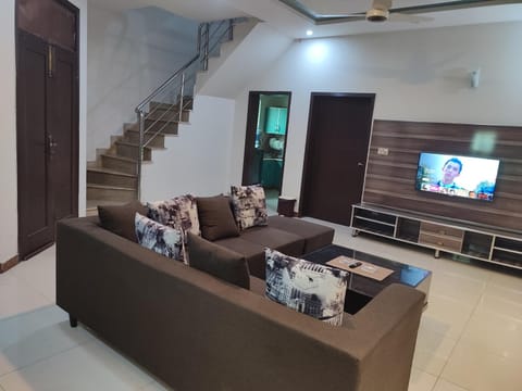 1 BR Serviced Holiday Home Near Lahore Ring Road House in Lahore
