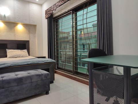 2 BR Serviced Holiday Home Near Lahore Ring Road House in Lahore