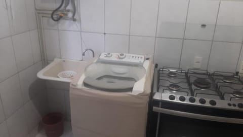 Kitchen or kitchenette, washing machine