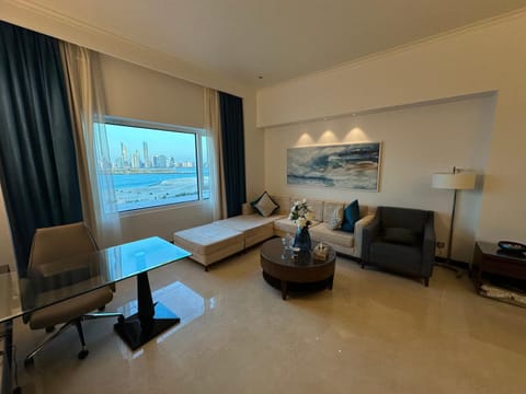 Living room, Seating area, Pool view