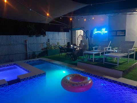 Patio, Night, Pool view, Swimming pool, sunbed