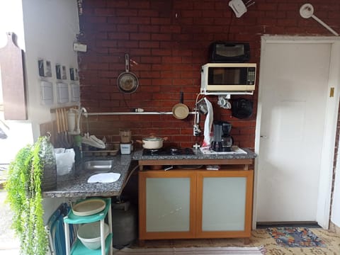 Kitchen or kitchenette, oven, stove