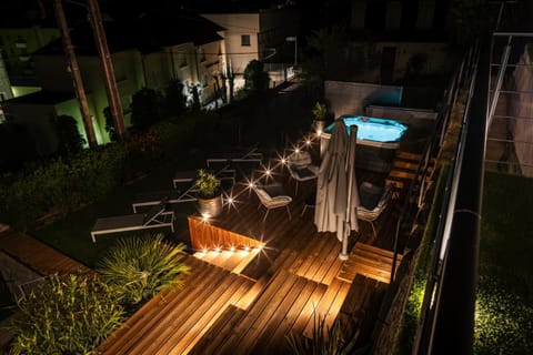 Patio, Night, Natural landscape, Hot Tub, Pool view, Swimming pool, sunbed