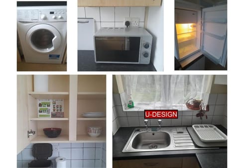 Kitchen or kitchenette, microwave, oven, stove, washing machine, dryer