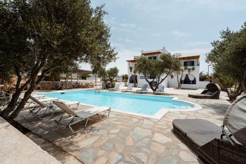 Property building, Patio, Swimming pool, sunbed