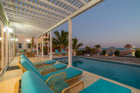 Balcony/Terrace, Seating area, Pool view, Sea view, Swimming pool, Sunset, sunbed