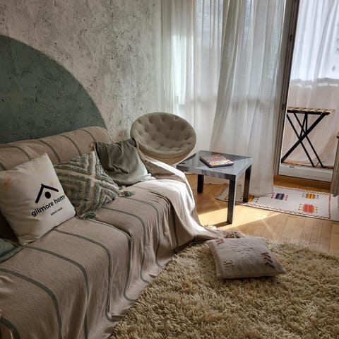 Bed, Living room, Seating area