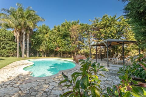 Patio, Day, Garden, Pool view, Swimming pool