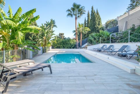 Property building, Living room, Swimming pool