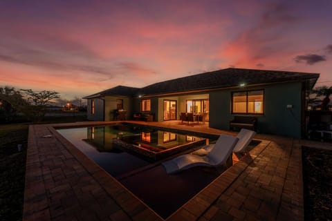 Property building, Patio, Night, Natural landscape, Pool view, Swimming pool, Sunrise, Sunset, sunbed