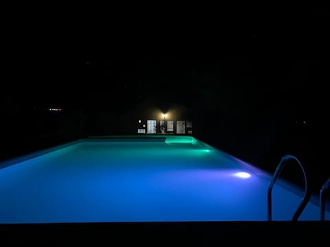 Restaurant/places to eat, Night, Pool view, Swimming pool