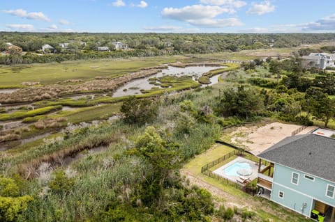 Luxurious Contemporary Retreat - Private Pool, Marsh Views, 3rd Row and near pier! House in Oak Island