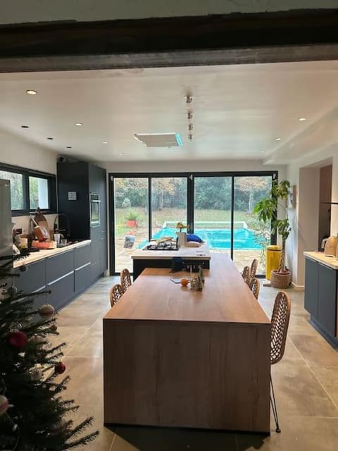 Kitchen or kitchenette, Dining area, Pool view