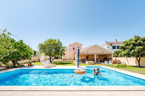 Children play ground, Pool view, Swimming pool, children, young children, older children, Family, sunbed