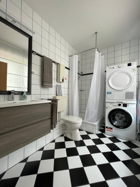 Shower, Bathroom, towels, washing machine, dryer