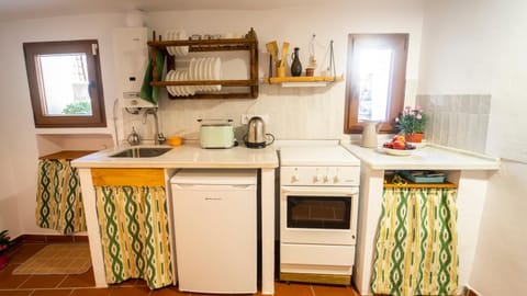 Kitchen or kitchenette, oven, stove