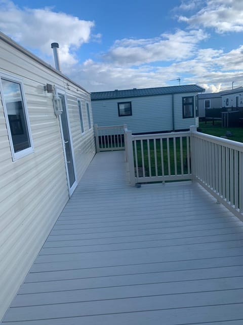 A14 is a 3 bedroom caravan on Whitehouse Leisure park with large decking Apartment in Towyn