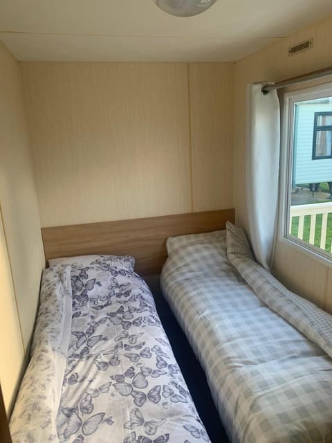 A14 is a 3 bedroom caravan on Whitehouse Leisure park with large decking Apartment in Towyn