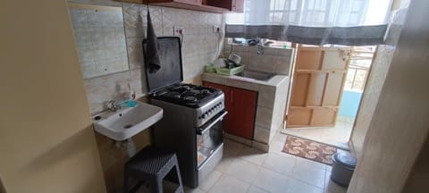 Kitchen or kitchenette, oven