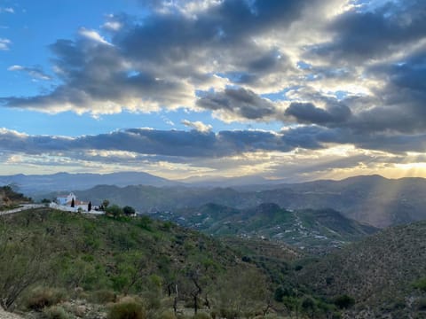 Property building, Nearby landmark, Day, Natural landscape, Mountain view, Sunset