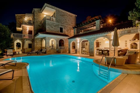 Patio, Night, Pool view, Swimming pool, sunbed