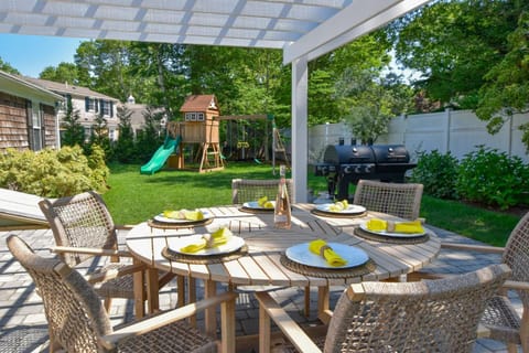 Swing Set Plunge pool and large yard await House in Osterville