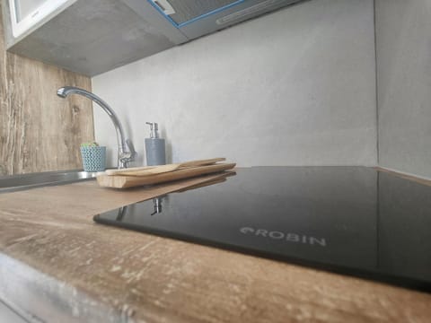 Kitchen or kitchenette, stove