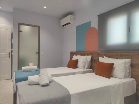 Bed, towels, air conditioner
