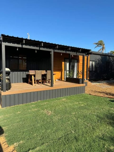 Property building, Patio, Dining area, Garden view