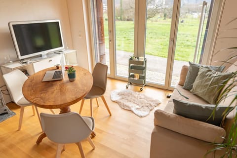 TV and multimedia, View (from property/room), Living room, Seating area, Dining area, Garden view