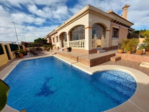 Property building, Patio, Day, Pool view, Swimming pool