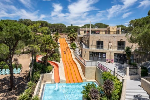 Property building, Day, Aqua park, Swimming pool, sunbed