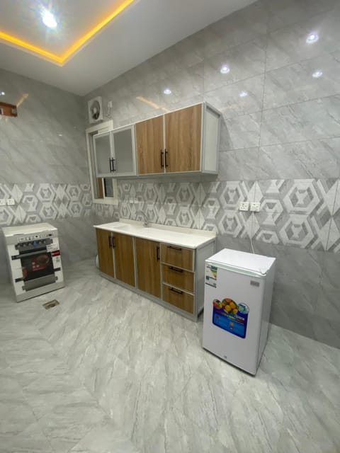 Kitchen or kitchenette, oven, stove