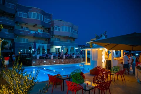 Property building, Night, Pool view, Swimming pool, sunbed