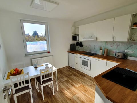 Dining area, dishwasher, stove, toaster, kitchen