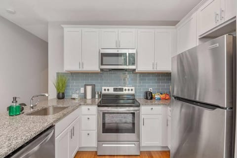 Kitchen or kitchenette, dishwasher, oven, stove, toaster