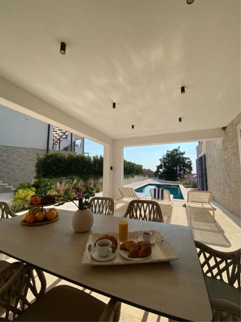 Patio, Dining area, Pool view, Swimming pool