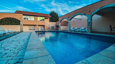 Property building, Swimming pool, Swimming pool, Sunset