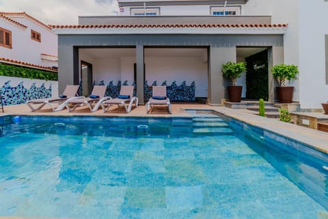 Property building, Day, Pool view, sunbed