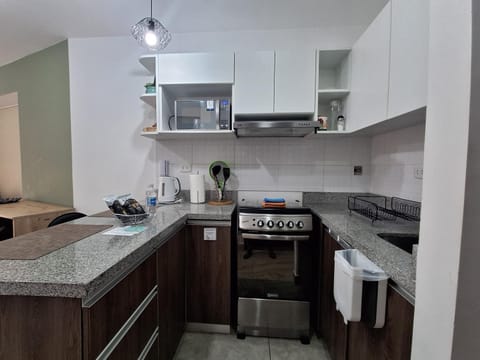 Kitchen or kitchenette, microwave, oven