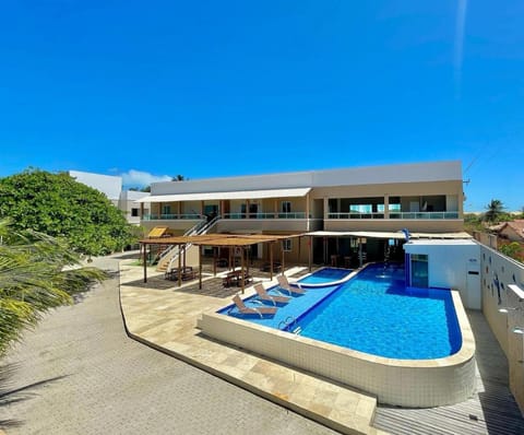 Property building, Pool view, Swimming pool, sunbed