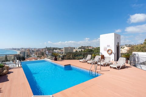 Property building, Living room, Swimming pool