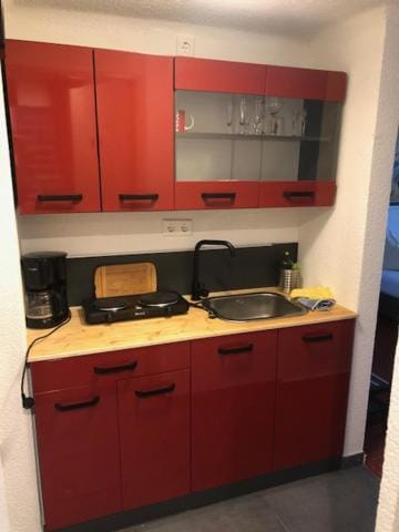 Kitchen or kitchenette, stove